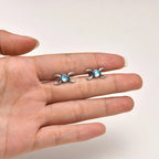 Kolmoiskuukorvakorut naisten wicca-noituus