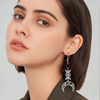 Kolmoiskuunsirpale roikkuvat korvakorut noituus wicca nainen