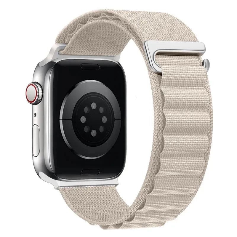 Apple Watchin beige sporttiranneke soljella