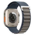 Apple Watchin siniharmaa sporttiranneke soljella