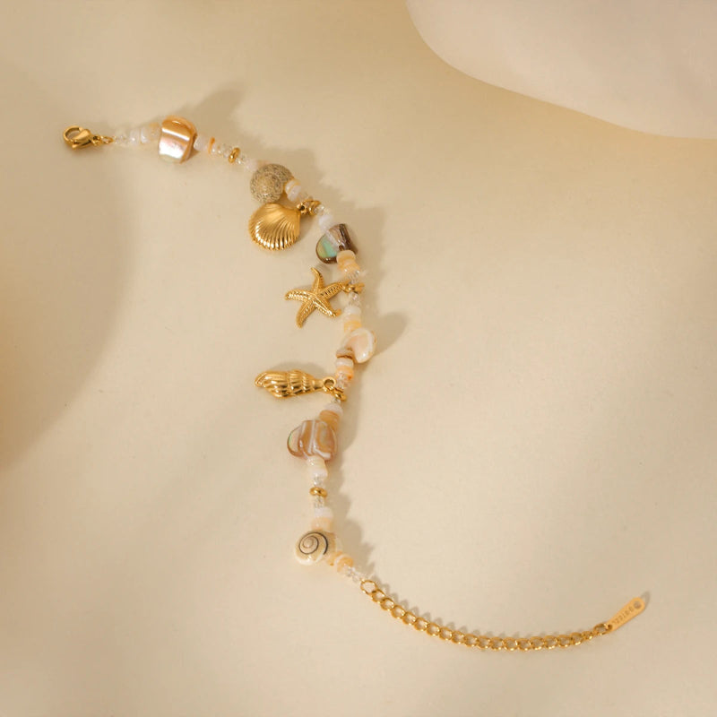 Rannekoru simpukoilla ja helmiäisellä