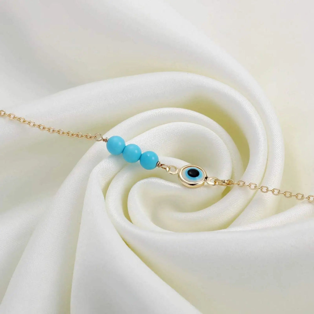 Rannekoru helmillä pahan silmän varalta