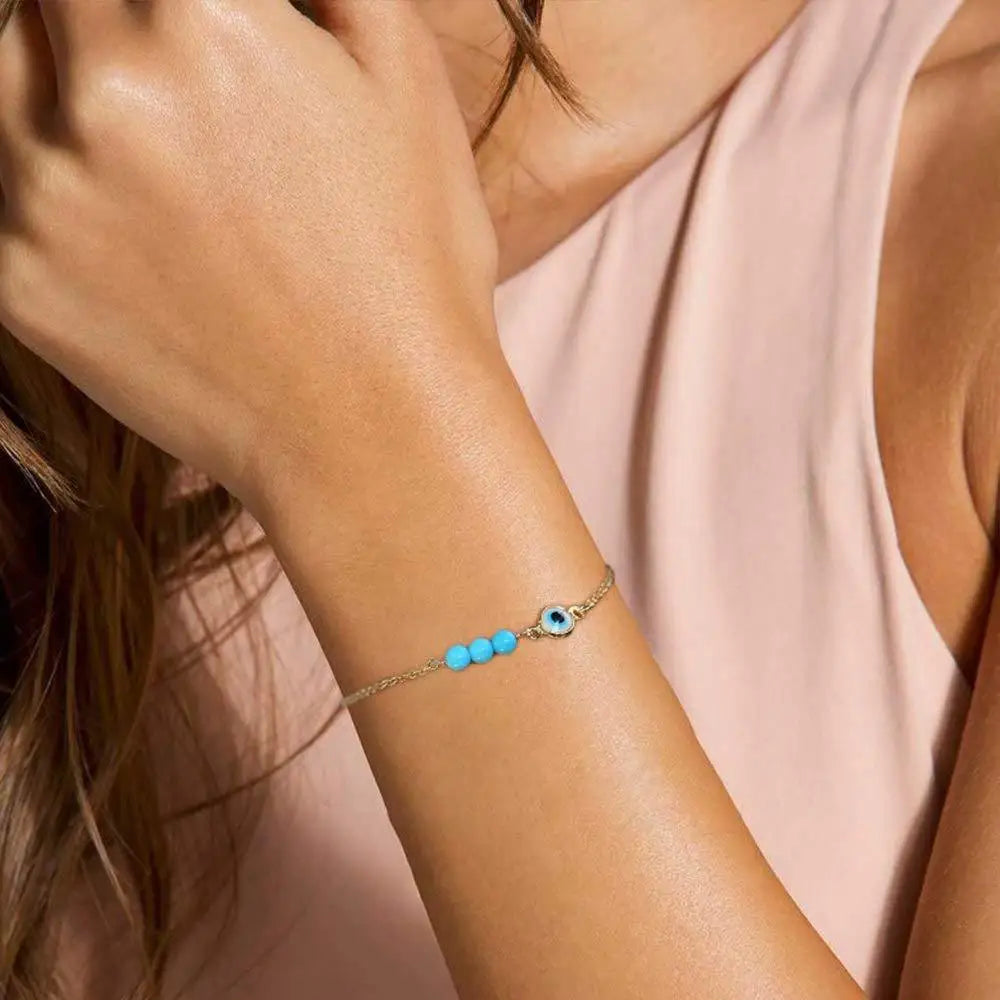 Rannekoru helmillä pahan silmän varalta