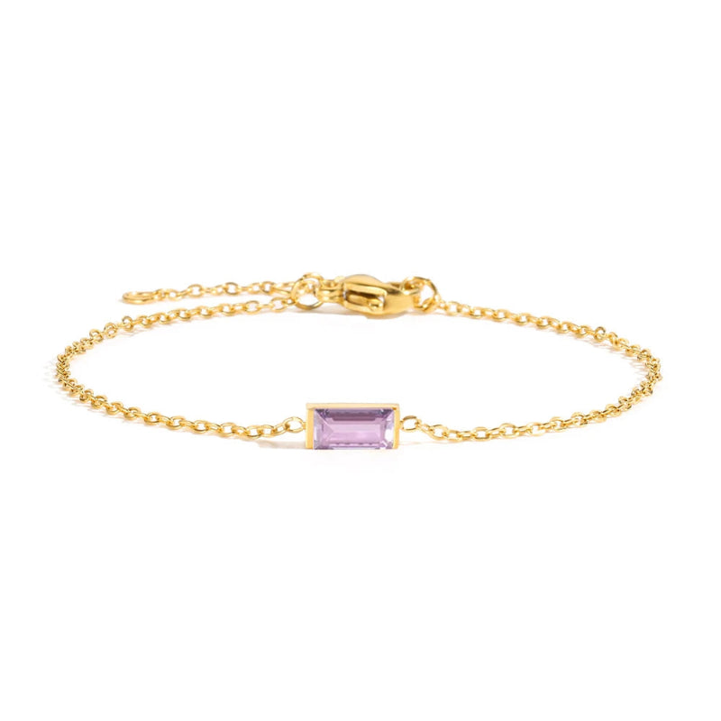 Rannekoru värillisellä syntymäkivellä