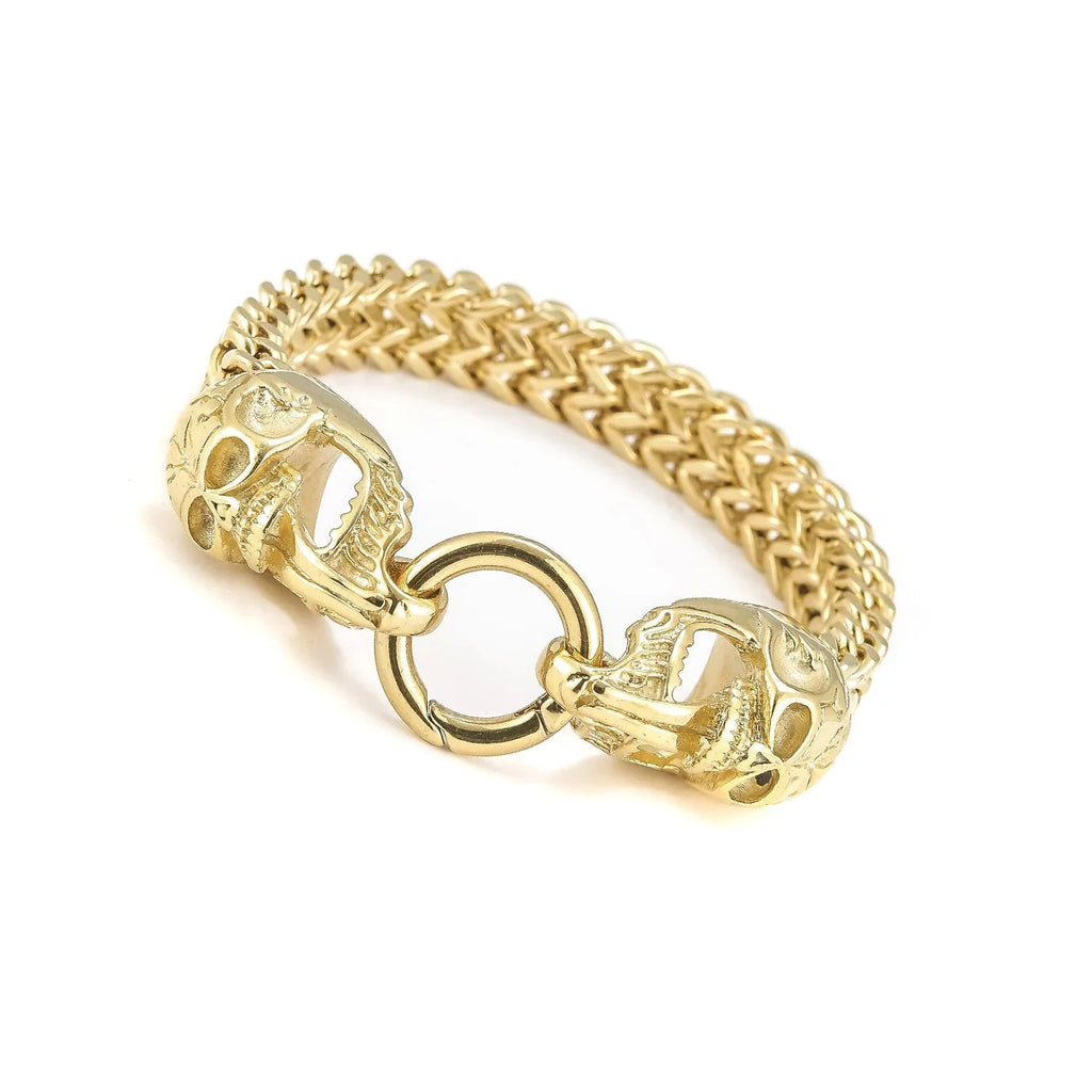 Rannekoru miesten kultaisilla kuolleenpään kuvilla