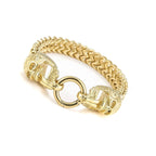 Rannekoru miesten kultaisilla kuolleenpään kuvilla