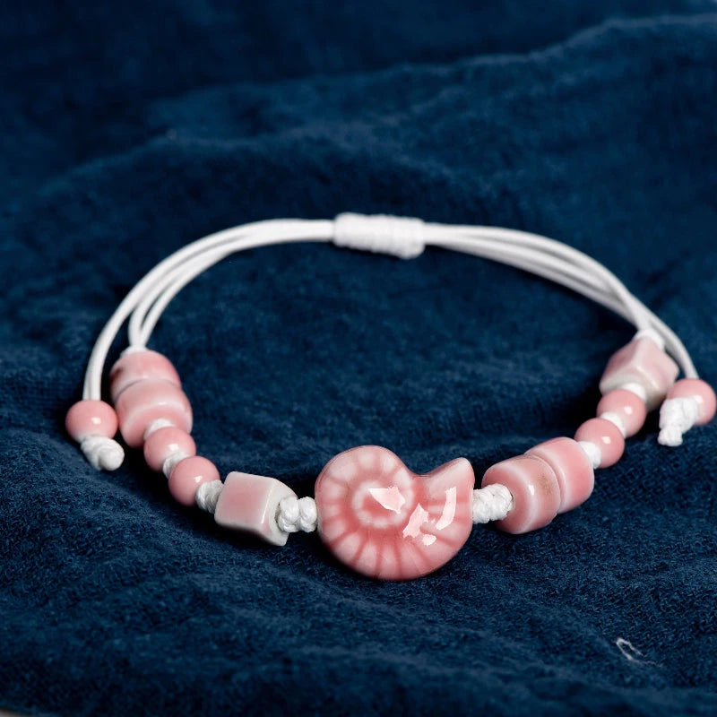 Bohémien rannerenkaat simpukka etana vaaleanpunainen