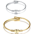 Sydänrannekoru alkukirjaimella 