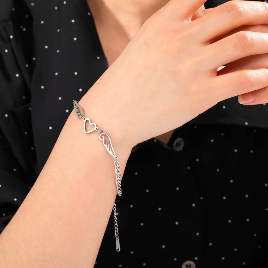 Sydän- ja enkelinsiipirannekoru hopeinen