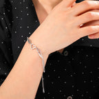 Sydän- ja enkelinsiipirannekoru hopeinen