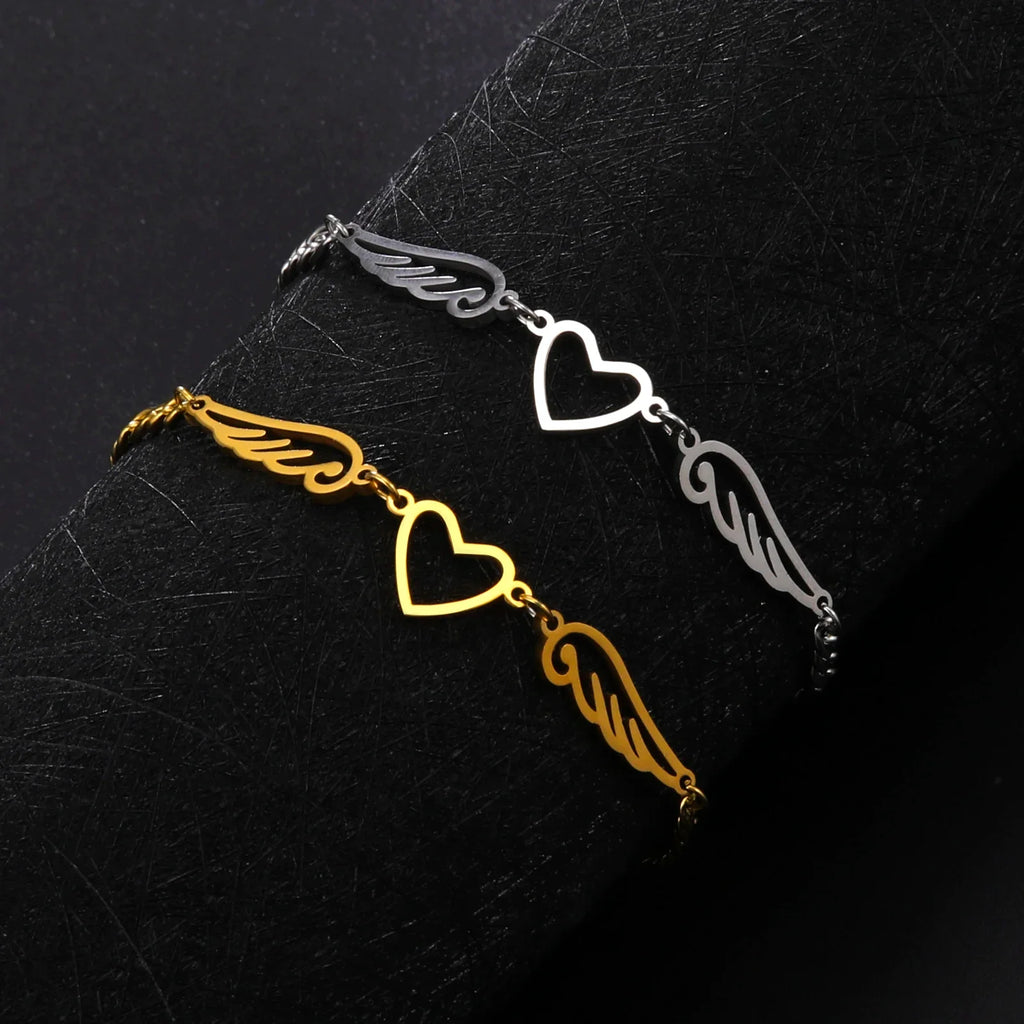 Sydän- ja enkelinsiipirannekoru kultainen