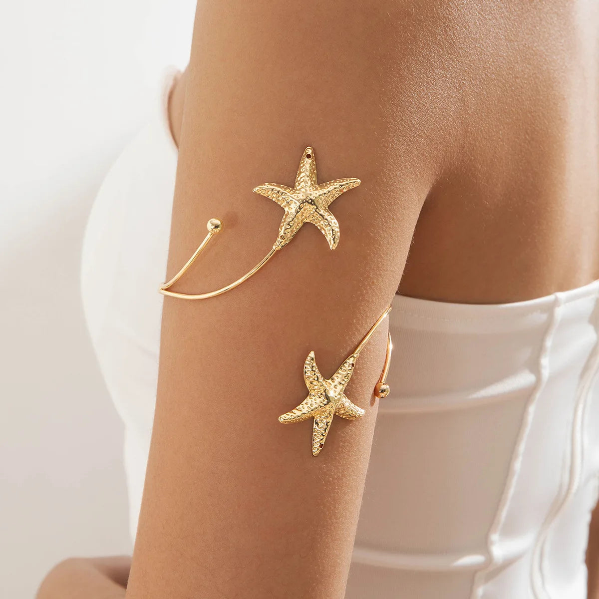 Boho-käsivarsirannekoru naisille - kultainen meritähden biceps-ketju