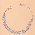 Kultainen ja hopeinen nilkkaketju timanteilla naisille 