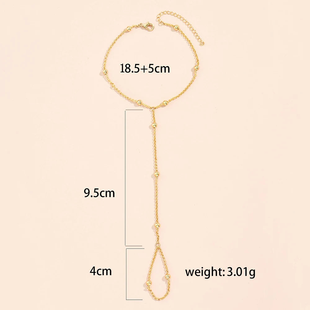 Naisille tarkoitettu rannekoru sormiketjulla & kädelle