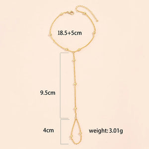 Naisille tarkoitettu rannekoru sormiketjulla & kädelle