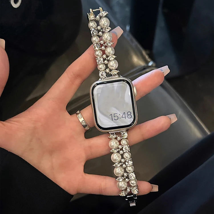 Korvaava ranneke Apple Watchille, jossa on strasseja ja hopeisia helmiä