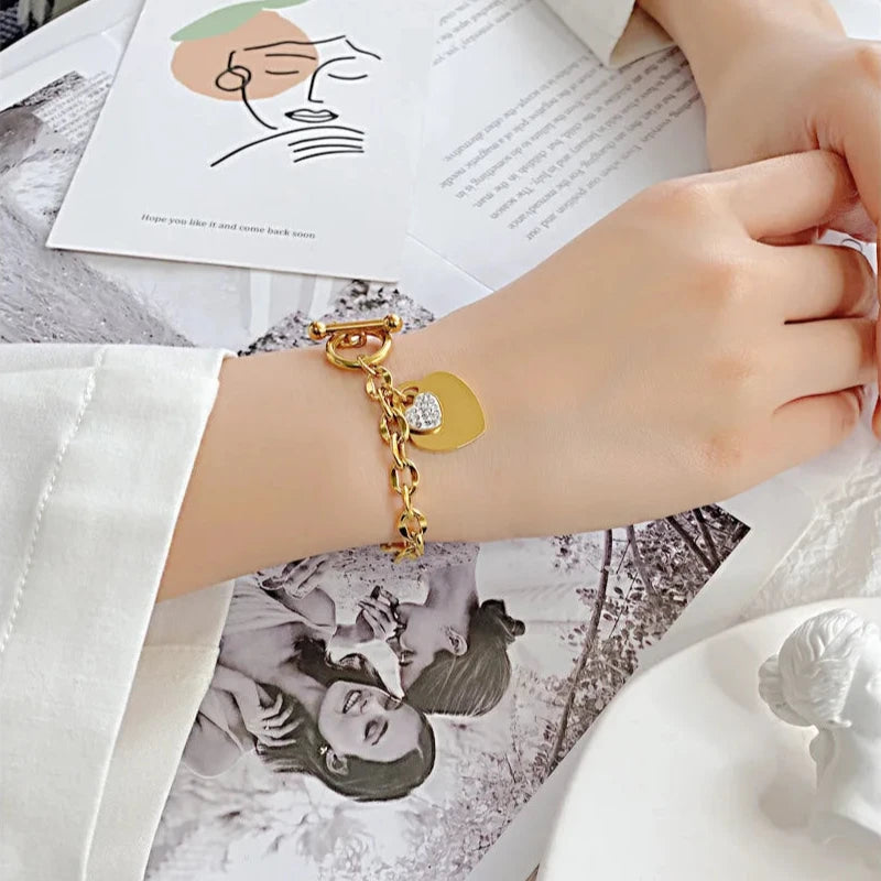 Kaksinkertainen sydänrannekoru naisille kulta