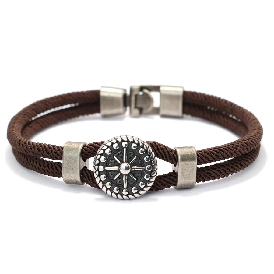 Narurannekoru ruskealla kompassiruusulla