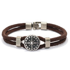 Narurannekoru ruskealla kompassiruusulla