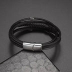 Egyptiläinen punottu nahkarannekoru Ankh-ristillä hopea