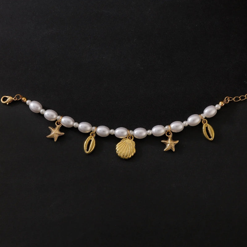 Helmikorusetti simpukoilla