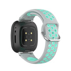 Fitbit Versa 3, Versa 4, Sense 1 ja Sense 2 -kellojen silikoniranneke harmaa ja syaani