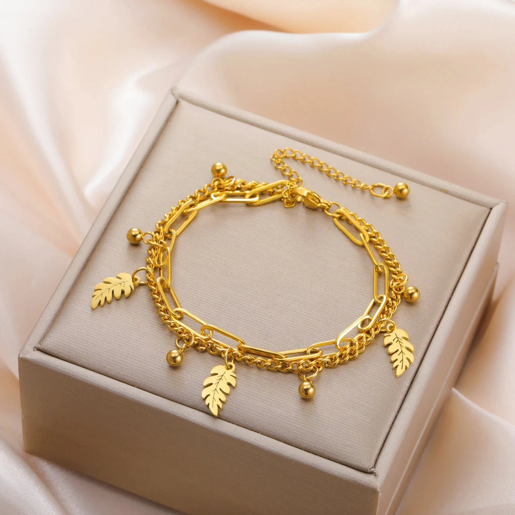 Palmulehden ja zirkonin rannekoru 