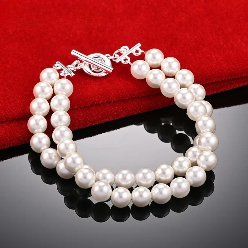 Retrotyylinen helmirannekoru