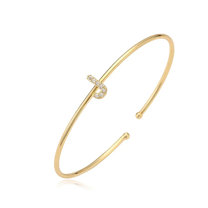 Minimalistinen nimikirjainrannekoru j