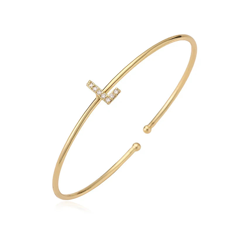 Minimalistinen nimikirjainrannekoru l