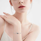 Hopeinen Panda-rannekoru