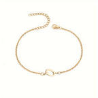 Personoitu rannekoru naiselle kultaisella alkukirjaimella o