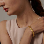 Rannekoru Retro Kuut ja Auringot zirkonilla