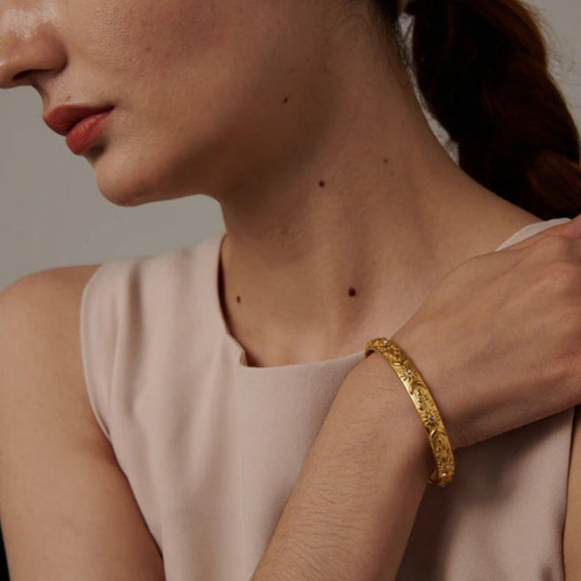 Rannekoru Retro Kuut ja Auringot zirkonilla