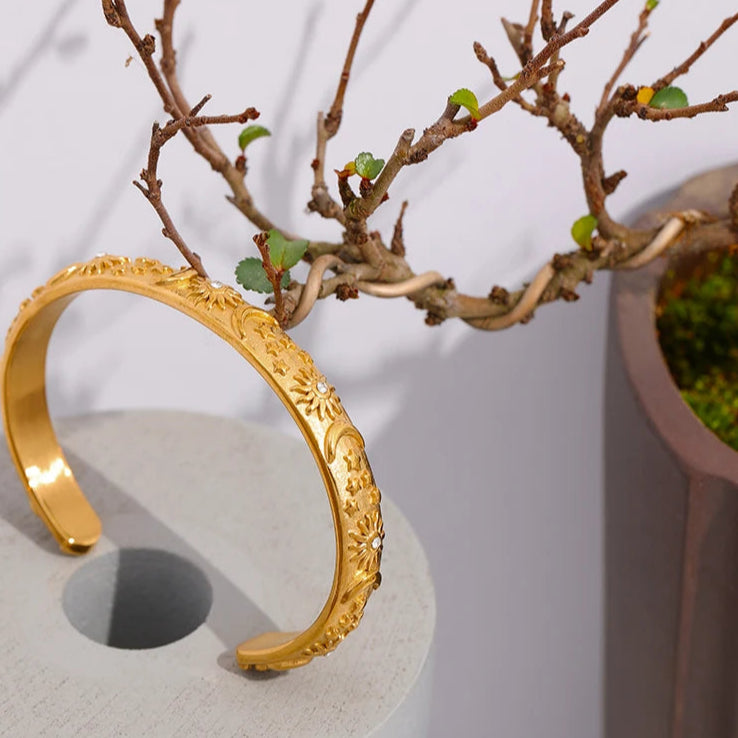 Rannekoru Retro Kuut ja Auringot zirkonilla