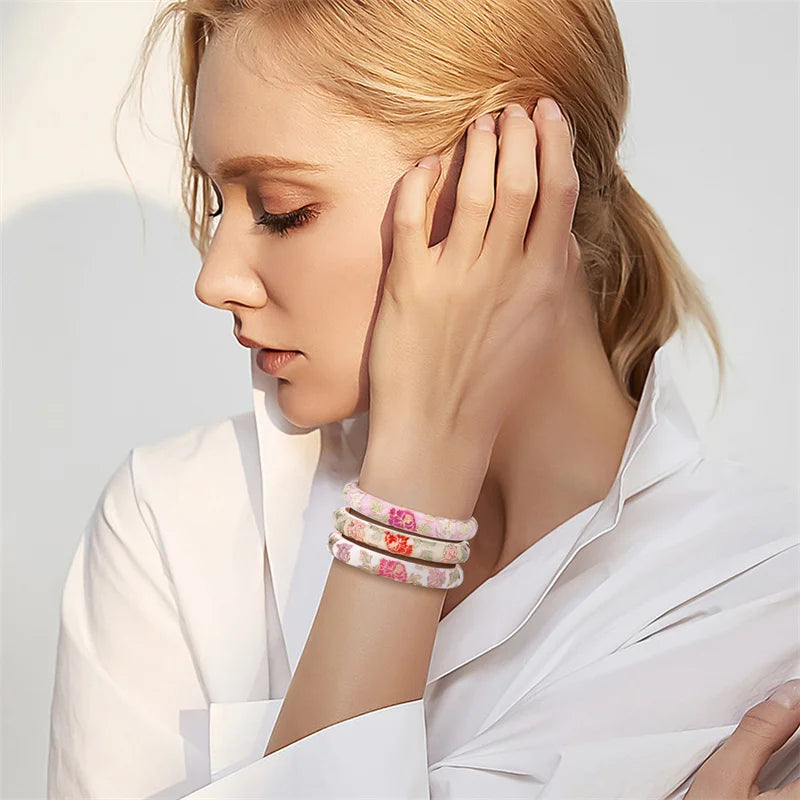 Romanttinen rannekoru kukkaketju oranssi