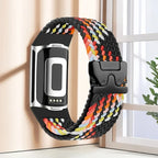 Punottu ranneke Fitbit Charge 5, Charge 6 -kelloon musta monivärinen