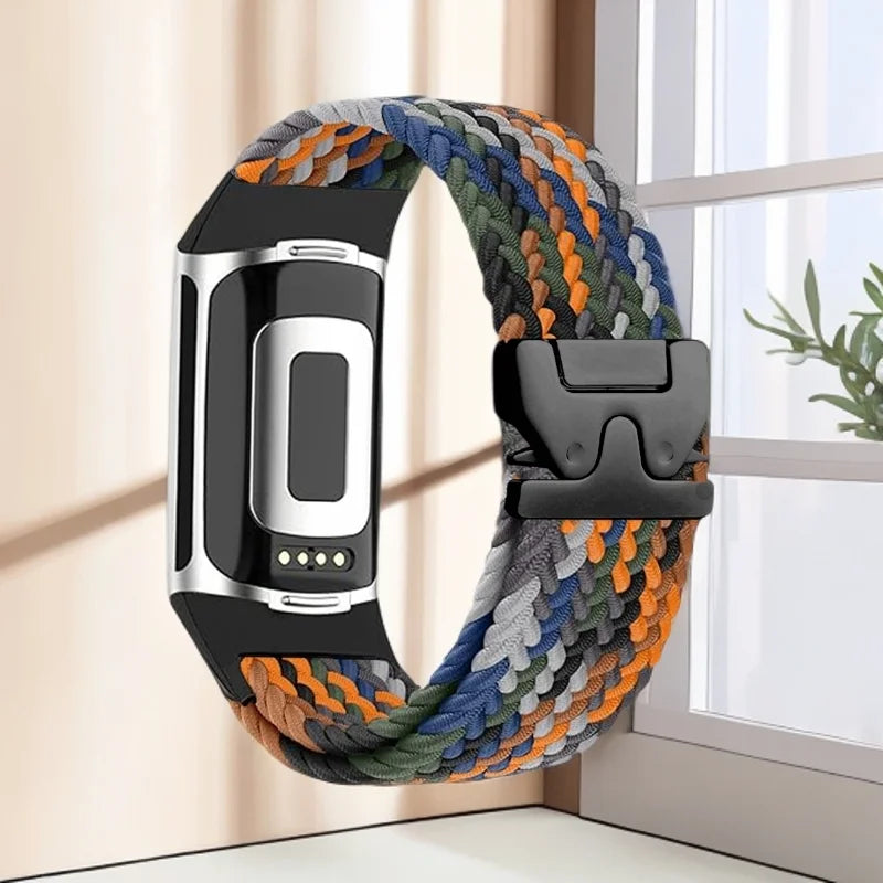 Punottu ranneke Fitbit Charge 5, Charge 6 -kelloon oranssi sininen vihreä