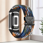 Punottu ranneke Fitbit Charge 5, Charge 6 -kelloon musta oranssi sininen