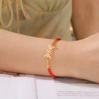 Punottu rannekoru Kolmoiskuunside Noituus Wiccan punainen ranneketju