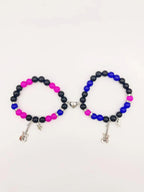 Magnettisormusparin rannekorut kitaralla