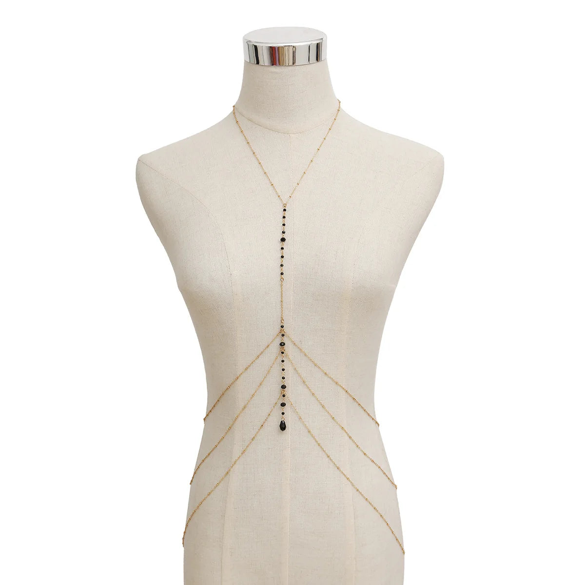 Naisille tarkoitettu musta kaulakoru Décolleté-ketjulla kullalla