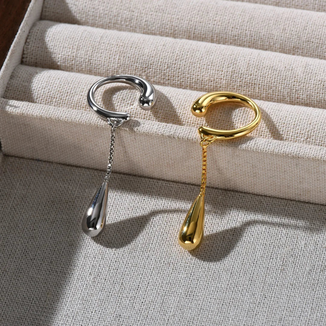 Korvakorut renkaat ohut vesipisara hopea