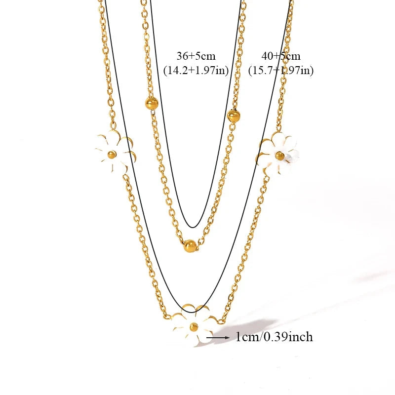 Kolmen kukan korusetti kulta 