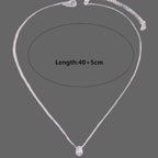 Kaulakoru, jossa on hieno vesipisara-riipus 