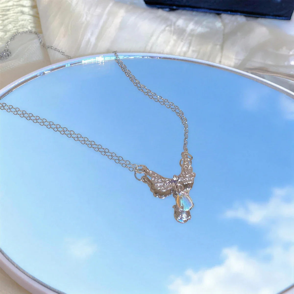 Kaulakoru enkelin siivet -riipuksella