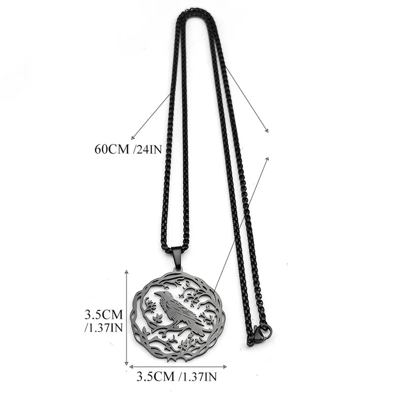 Kaulakoru riipuksella, jossa puu ja lintu