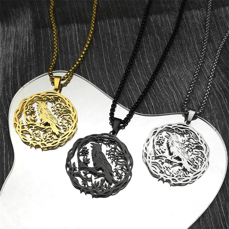 Kaulakoru riipuksella, jossa puu ja lintu hopea