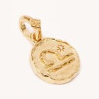 Kaulakoru astrologisella riipuksella, horoskooppimerkki