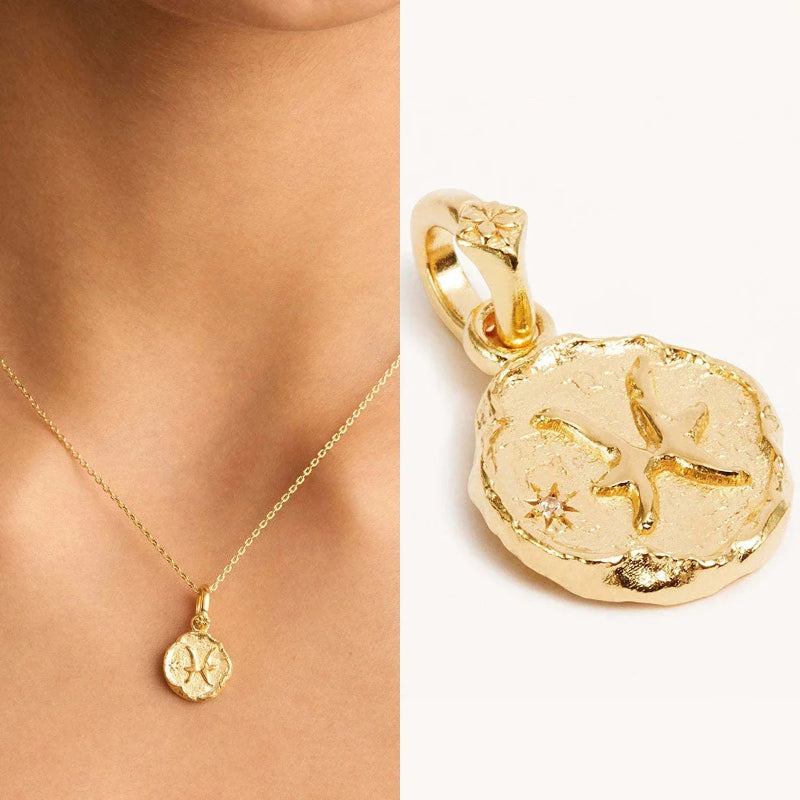 Kaulakoru astrologisella riipuksella, horoskooppimerkki